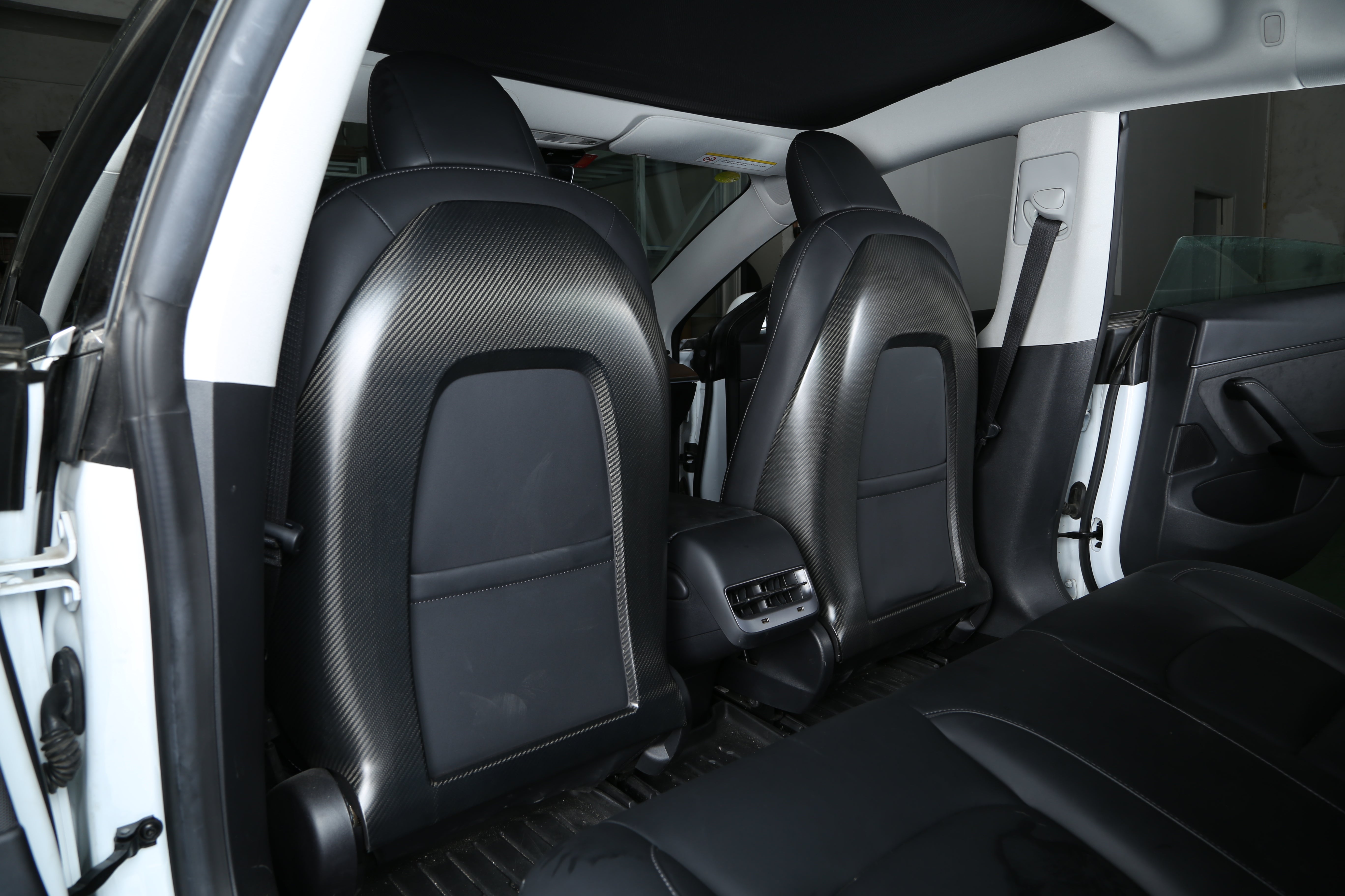 DynaCarbon™ Hard Carbon Fiber Front Seats Trim for Tesla Model 3/Y 2017-2023