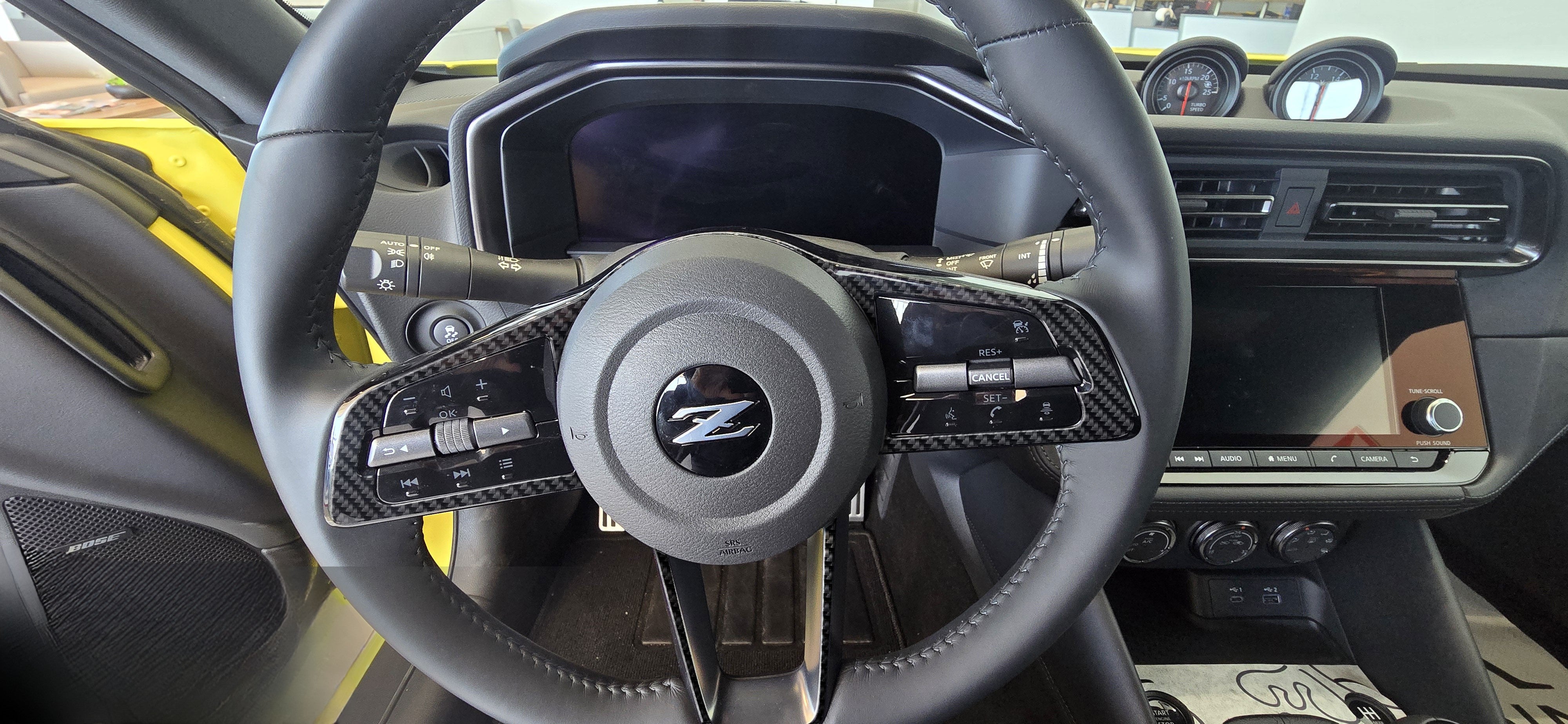 DynaCarbon™️ Carbon Fiber Steering Trim Nissan Z 2023-2026