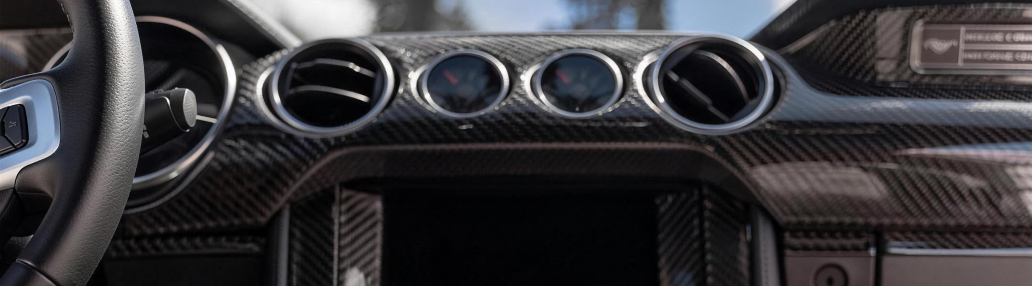 Dyna Performance Mustang carbon fiber dashboard vents and gauges