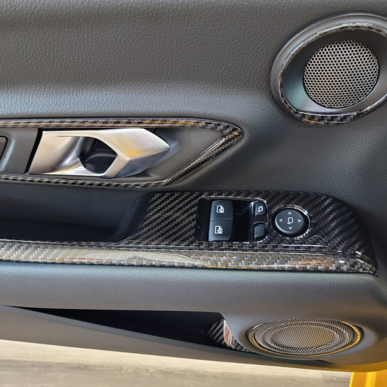 DynaCarbon™️ Carbon Fiber Window Control Trim for Toyota Supra 2019-2023