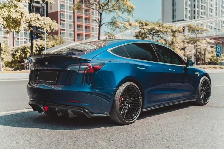 DynaCarbon™ Hard Carbon Fiber Rear Bumper Diffuser Trim for Tesla Model 3 CMST Type 2017-2023