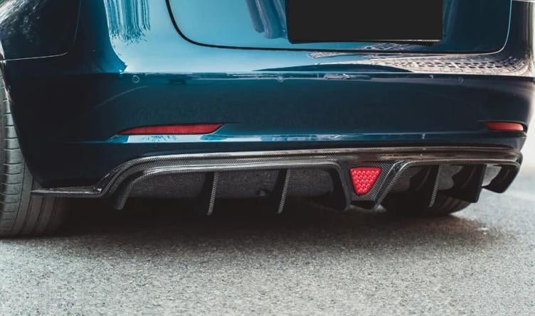 DynaCarbon™ Hard Carbon Fiber Rear Bumper Diffuser Trim for Tesla Model 3 CMST Type 2017-2023