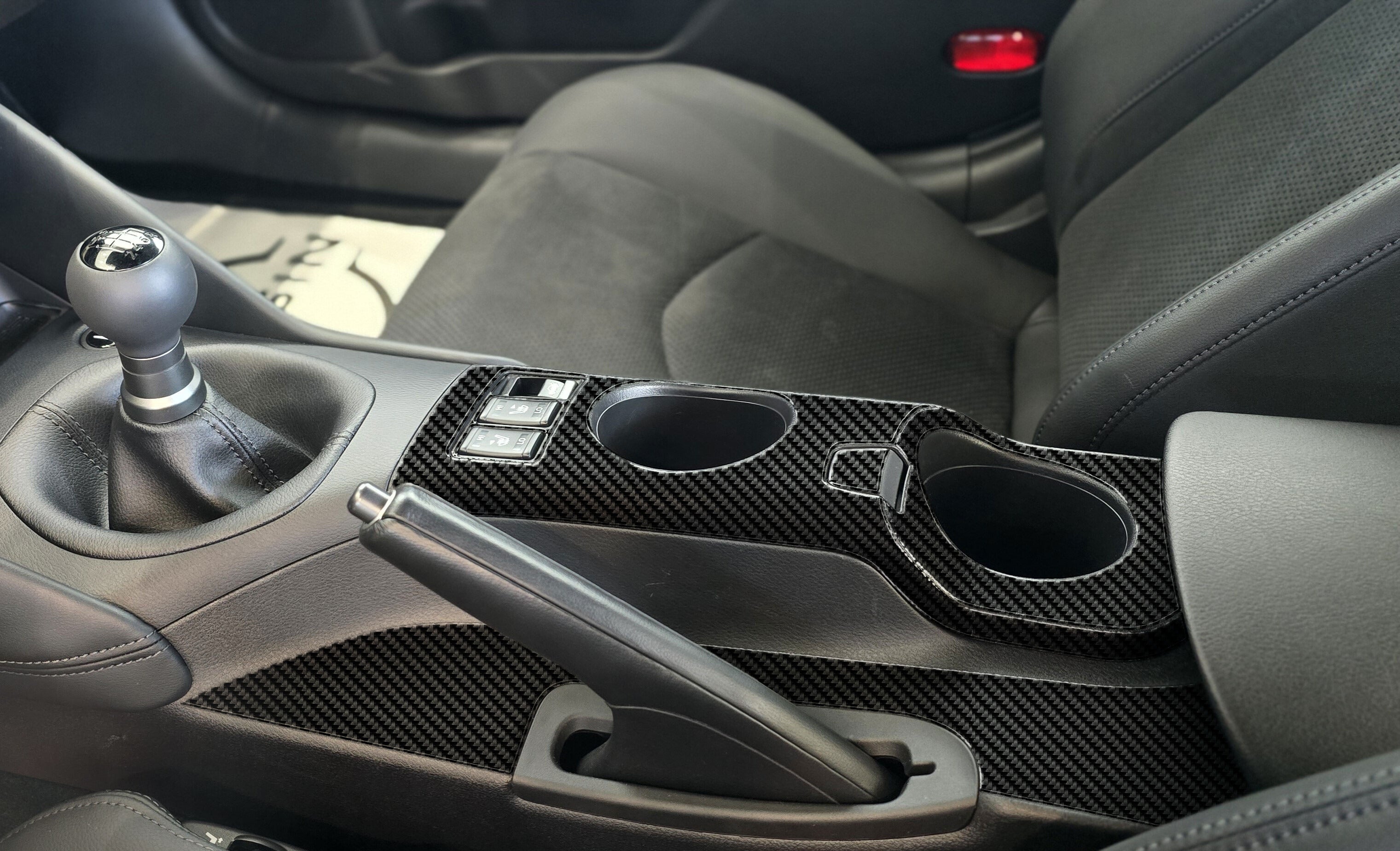 DynaCarbon™️ Carbon Fiber Handbrake and Cupholder Trim Nissan Z 2023-2026